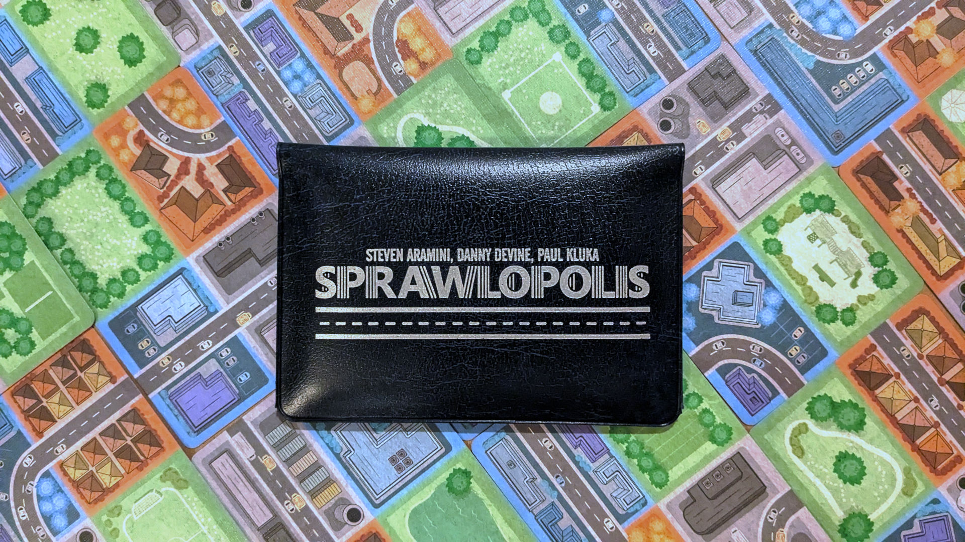 Sprawlopolis wallet cover on cards